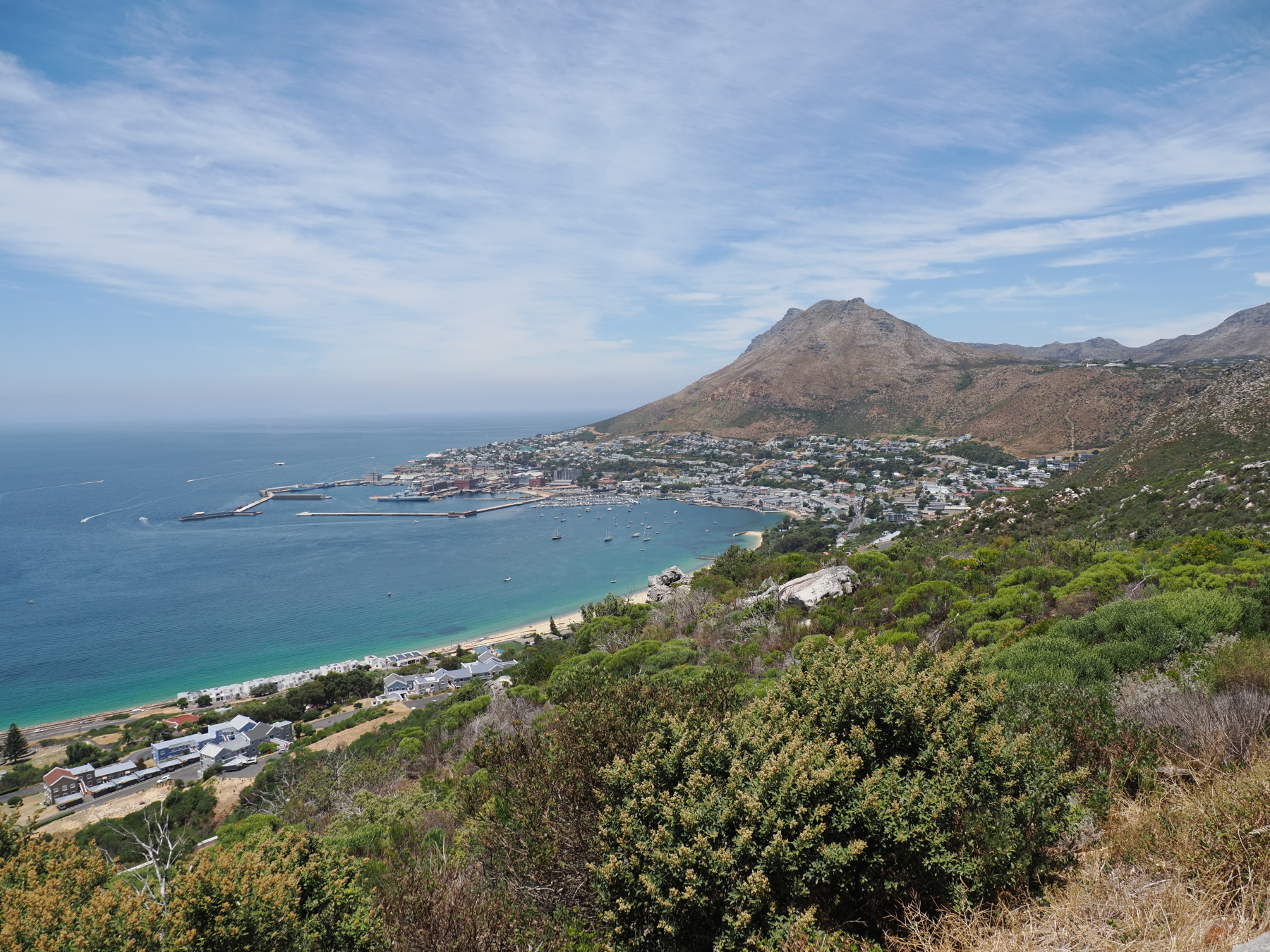 Simon's Town. The navy is on the near side of town. The penguins were on the far side of town